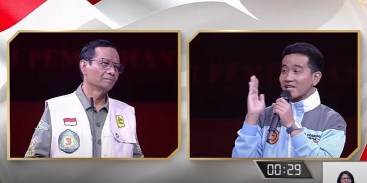 Interaksi Gibran Rakabuming Raka dan Mahfud MD pada Debat Cawapres yang digelar KPU RI, Minggu malam (21/01/2024).(Foto:tangkapan layar saluran Youtube KPU RI)