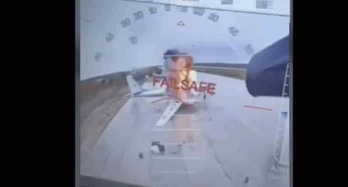 Gambar diambil dari video yang dirilis pada 1 Juni 2025 oleh sumber dari Dinas Keamanan Ukraina ini. Terlihat sebuah drone Ukraina menyerang pesawat-pesawat Rusia jauh di dalam wilayah Rusia.(APNews)